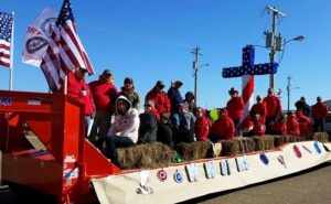 The Wounded Warriors of Mississippi said it all with their Dixie National Rodeo parade float. Note the cross and the American flag!