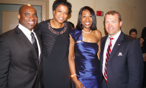 Husband Anthony Granderson, Peggie, Jennifer Gillom and Athletic Director Ross Bjork celebrate the induction of Peggie and Jennifer into the Ole Miss Sports Hall of Fame.