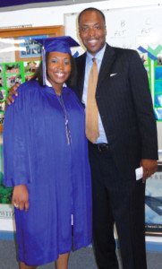 Chris congratulates his oldest daughter, Christina, on her graduation day.