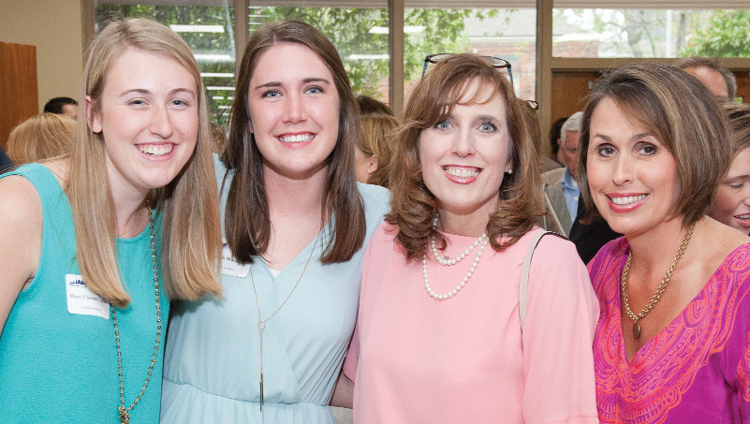 Mothers and Daughters! Mary Chosen Caples, Hannah Wootton, seniors at Jackson Academy enjoy the reception with their moms, Amanda Wootton and Sylvia Caples.