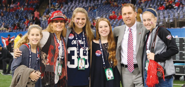 Celebrating the 2016 Sugar Bowl victory are Madison, Jill, Shannon DeLoach (an honorary Freeze family member), Jordan, Coach Hugh, and Ragan.