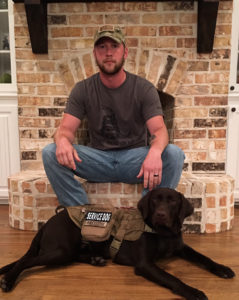 Veteran Chris Campbell and his service dog, Freedom.