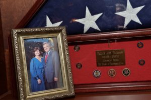 This flag was draped over Alan’s casket. The pins below hebwore on his lapel for 16 years in the State Senate. The 3 larger pins were the ones he wore in Congress—one for each term.
