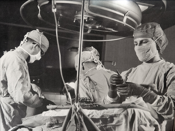 Joyce (right) assisting on the groundbreaking day of the heart transplant.
