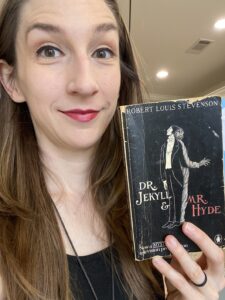 UNCROPPED_ Katie Ginn holding a book
